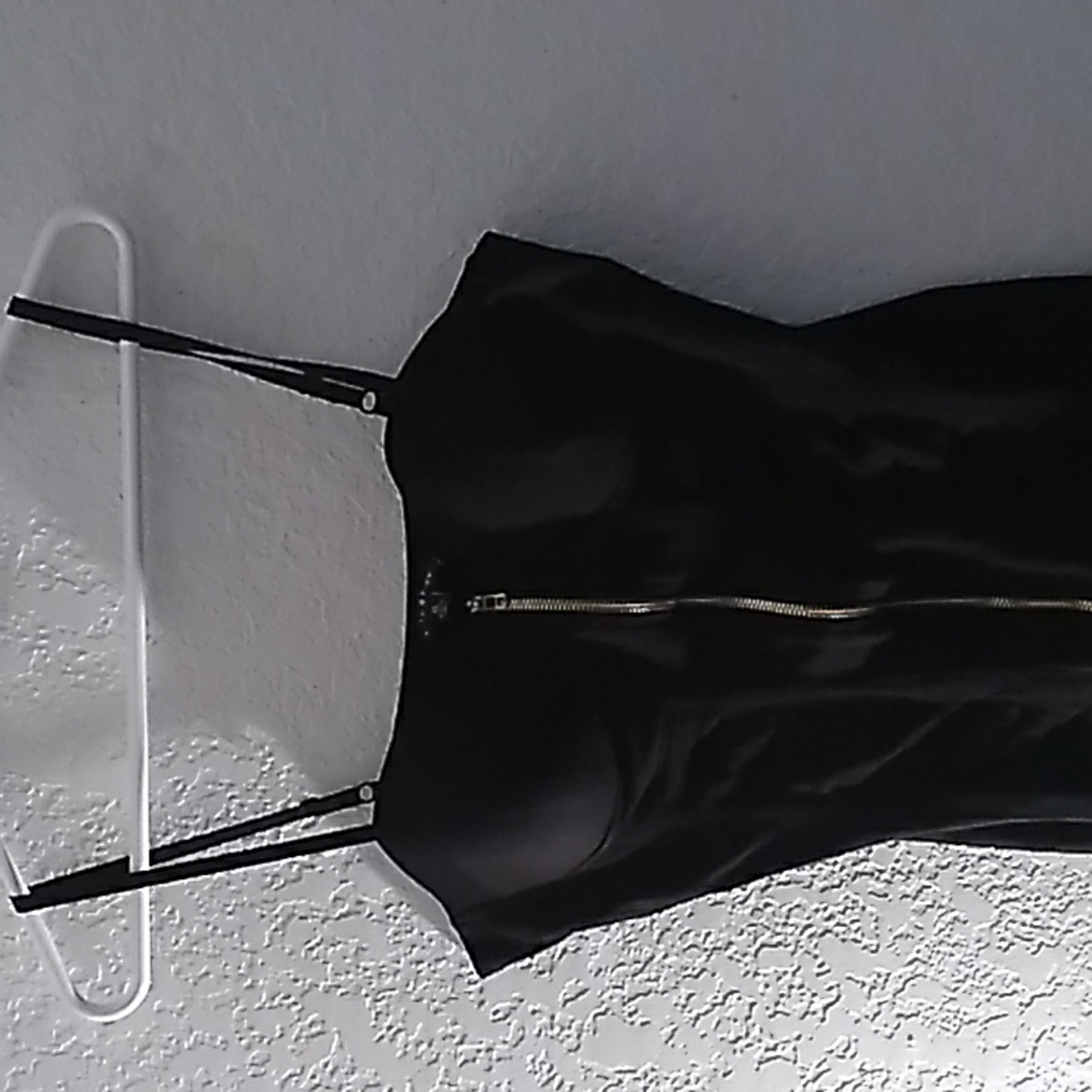 Black zip up dress with breast cups.